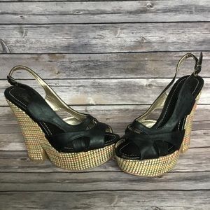 Fusion black slingback wedge heels.
